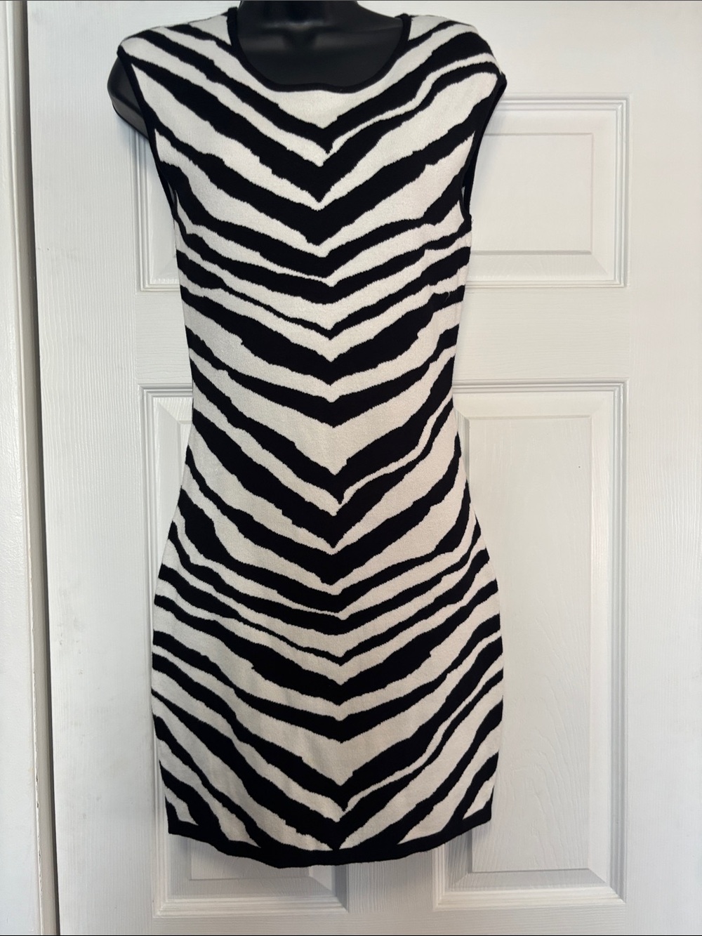 Express sleeveless zebra sweater dress